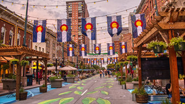 Larimer Square in Denver Colorado with Colorado flags flying.